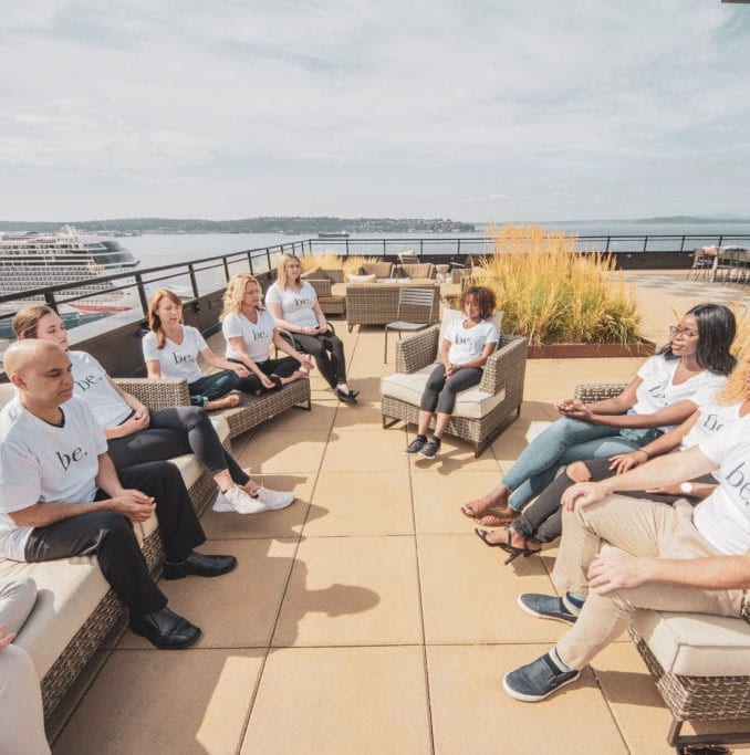 Group meditating outside